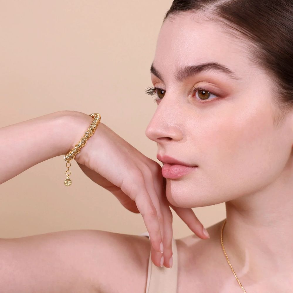 Bracciale Etrusca Gioielli con Rondelle Martellate e Sfere Lucide